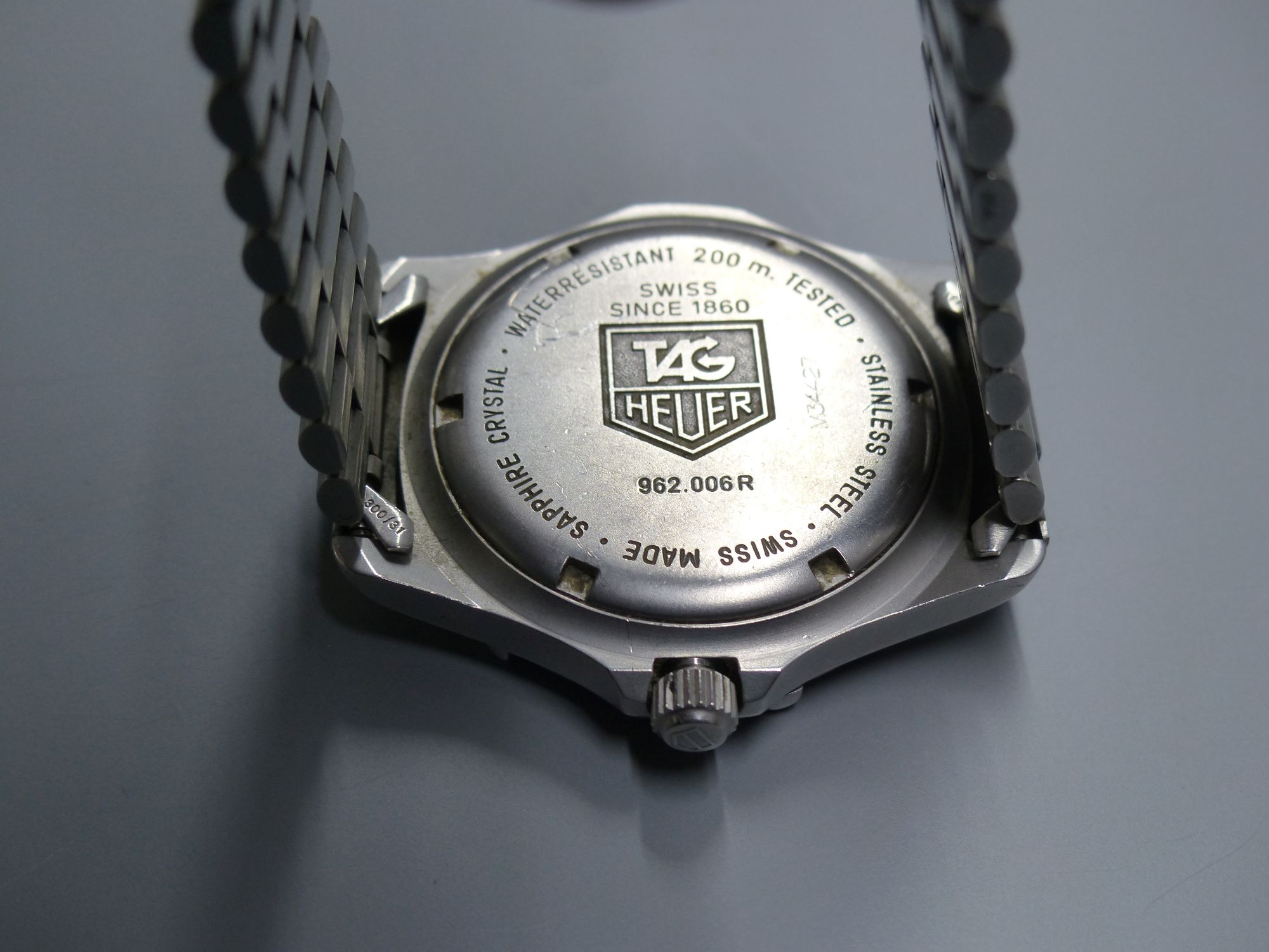 A gentlemans modern stainless steel Tag Heuer Professional quartz wrist watch, on stainless steel Tag bracelet,